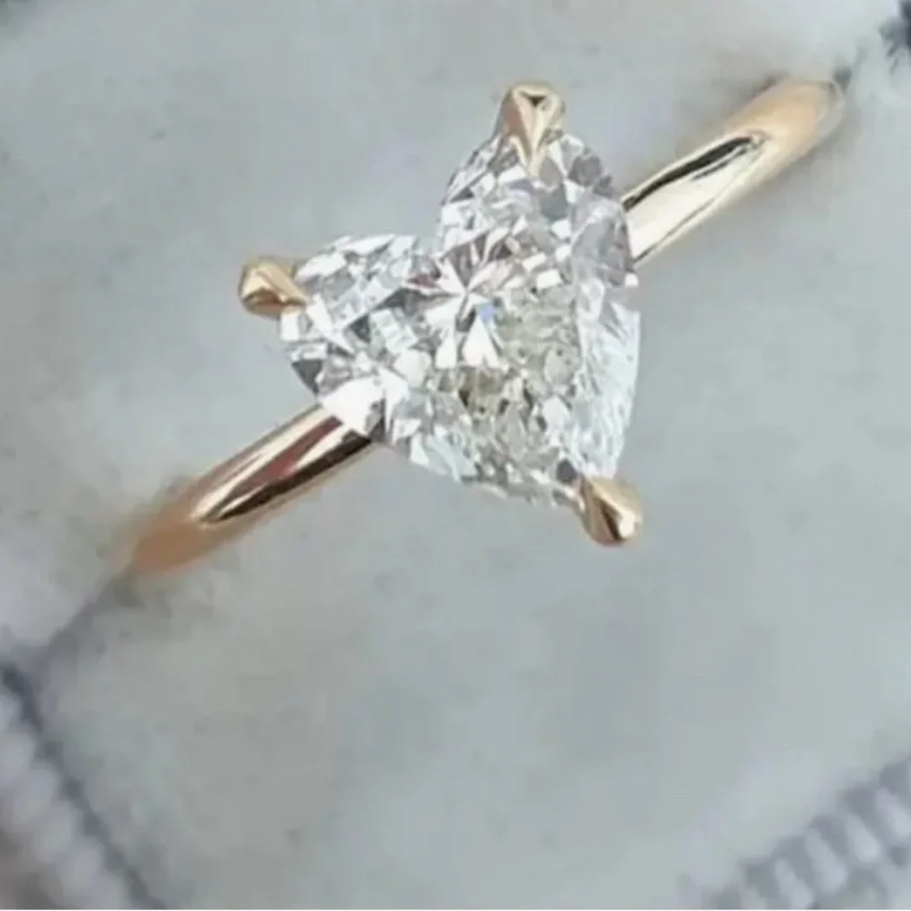 Heart Shaped Engagement Ring with Inlaid Gem